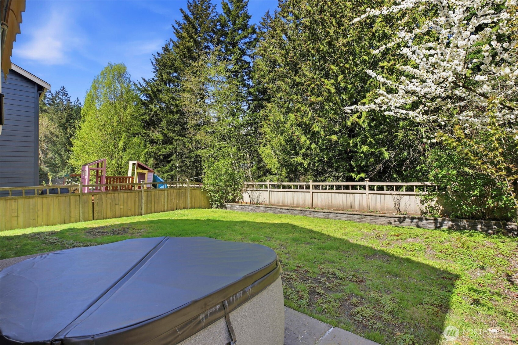 3662 London Loop Northeast Lacey, WA 98516 - Photo 34 of 40 a view of yard with swimming pool and green space