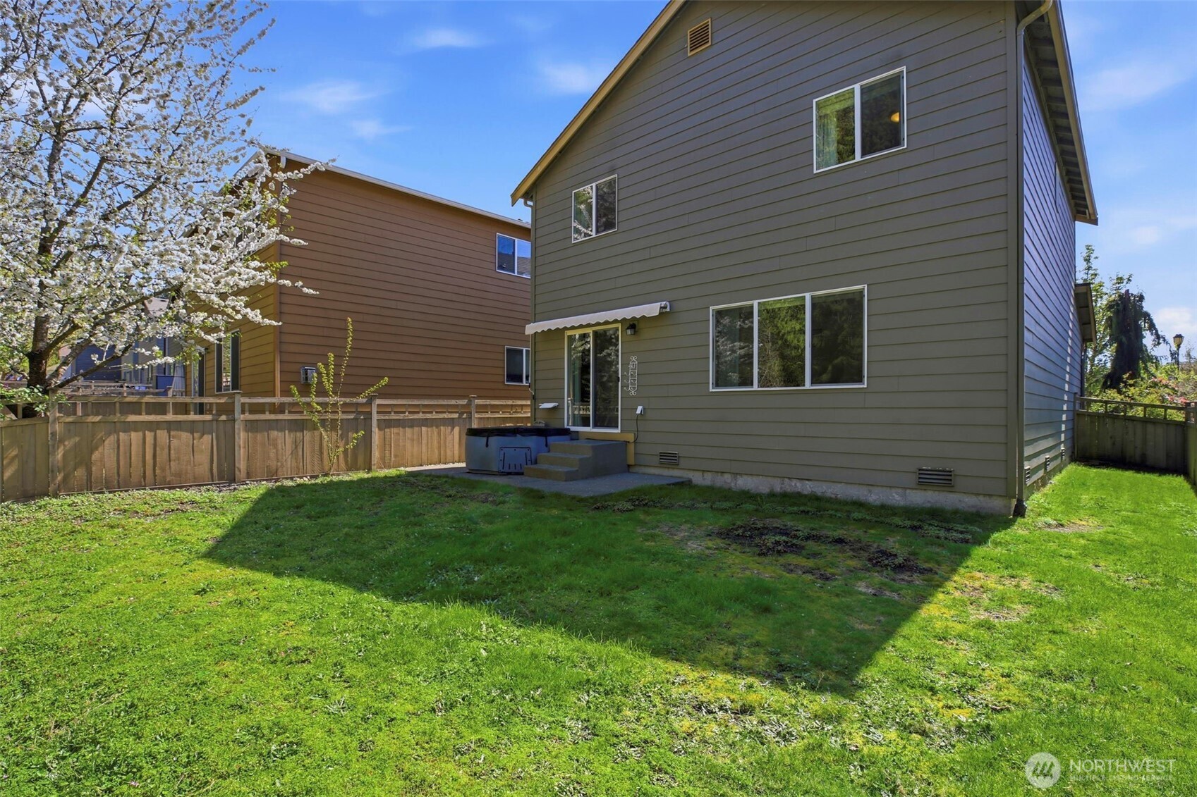 3662 London Loop Northeast Lacey, WA 98516 - Photo 36 of 40 a view of backyard of house with deck and outdoor seating