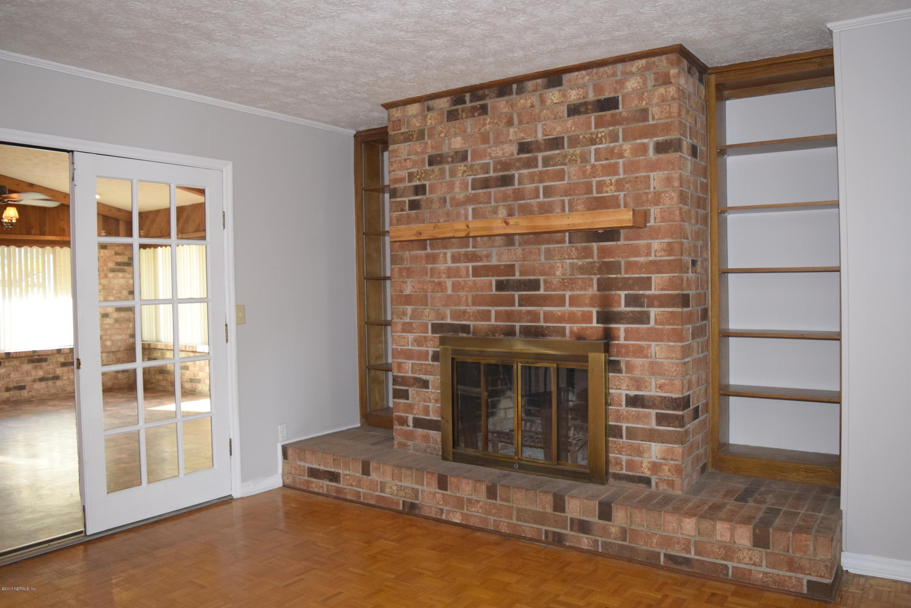 2930 Greenridge Road Orange Park, FL 32073 - Photo 23 of 52 Brick fireplace with shelves