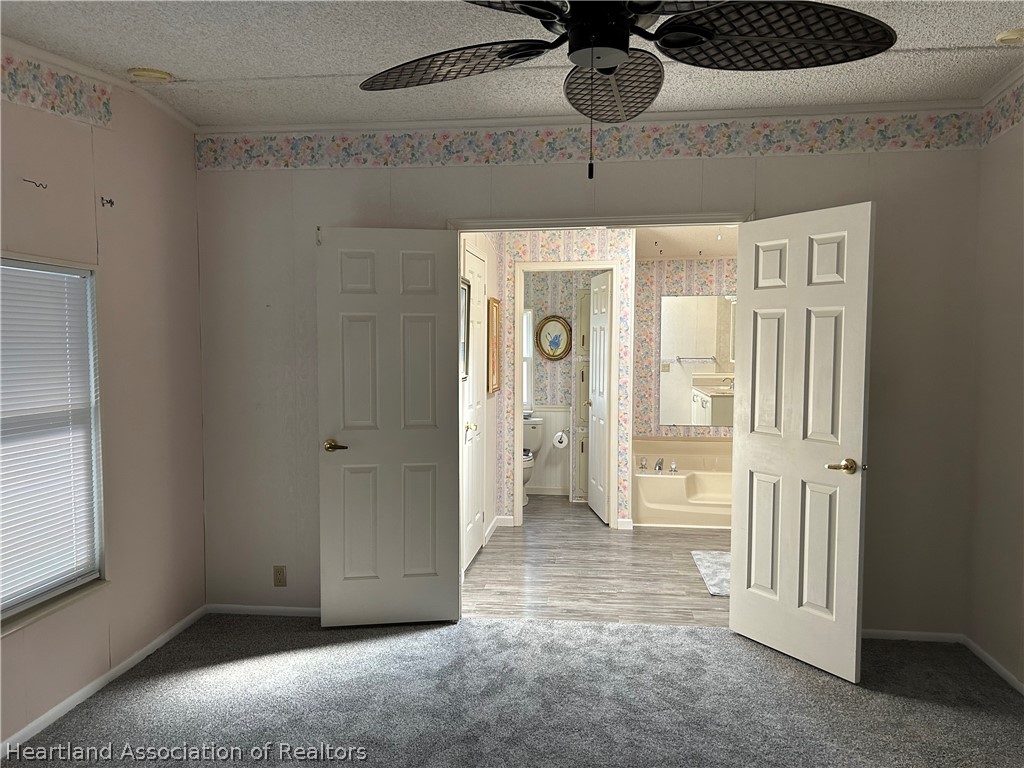337 Hickory Ridge Drive Sebring, FL 33876 - Photo 12 of 48 a view of a hallway with a bathroom