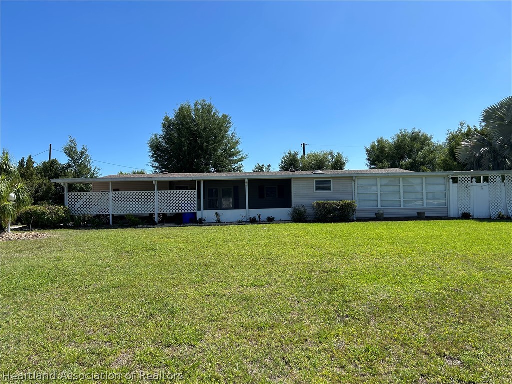 337 Hickory Ridge Drive Sebring, FL 33876 - Photo 2 of 48 a view of a back yard