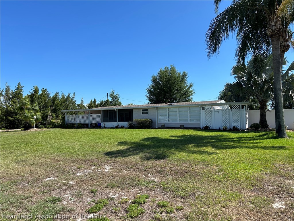 337 Hickory Ridge Drive Sebring, FL 33876 - Photo 3 of 48 a view of a backyard