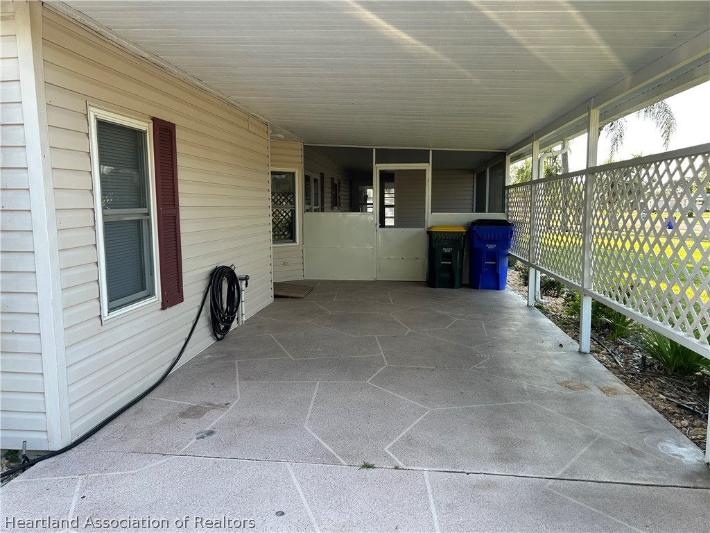 337 Hickory Ridge Drive Sebring, FL 33876 - Photo 38 of 48 a view of an empty room with a window