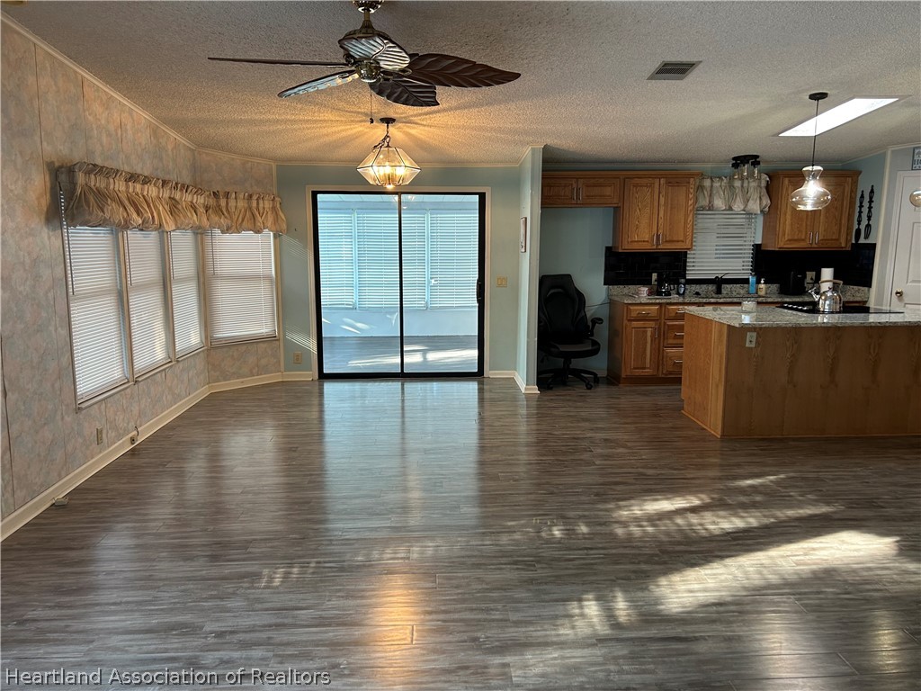 337 Hickory Ridge Drive Sebring, FL 33876 - Photo 43 of 48 a view of a room with wooden floor