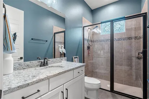 a bathroom with a sink a mirror and a bathtub
