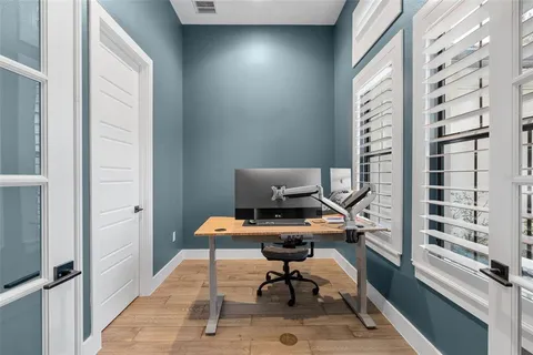 a view of a swimming pool with a patio