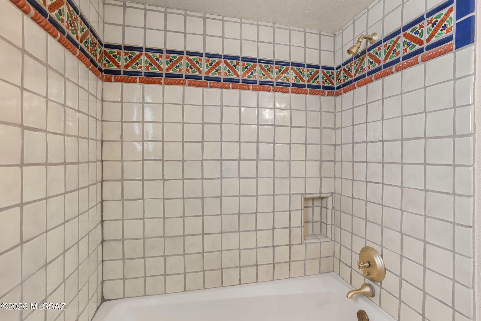 7171 South X9 Ranch Road Vail, AZ 85641 - Photo 26 of 50 Custom tiled tub/shower in Guest Bath 2