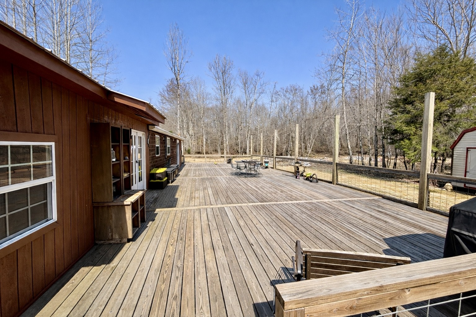 664 Russ Valley Road Lobelville, TN 37097 - Photo 13 of 57 a view of outdoor space with wooden floor and seating space
