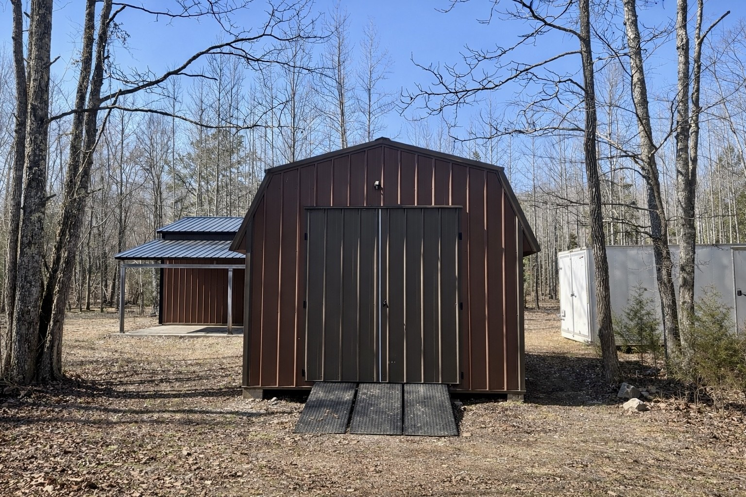 664 Russ Valley Road Lobelville, TN 37097 - Photo 23 of 57 a view of a house with a small yard