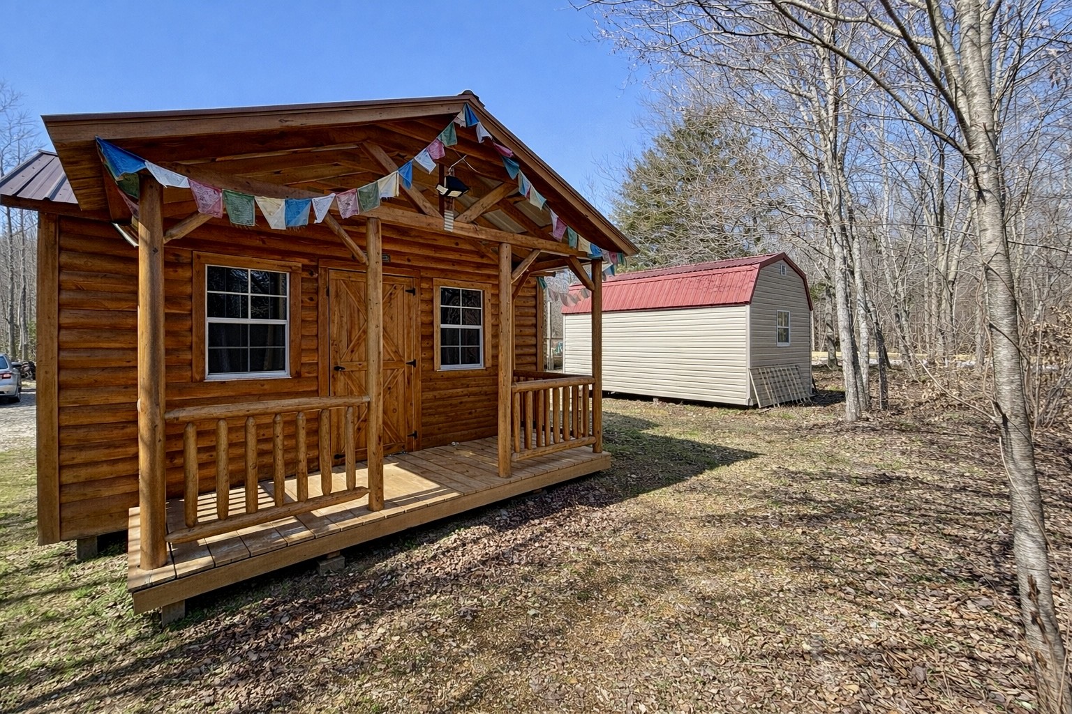 664 Russ Valley Road Lobelville, TN 37097 - Photo 25 of 57 a front view of a house with garage
