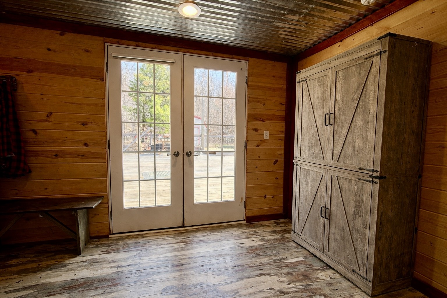 664 Russ Valley Road Lobelville, TN 37097 - Photo 41 of 57 a view of an empty room with wooden floor and a window