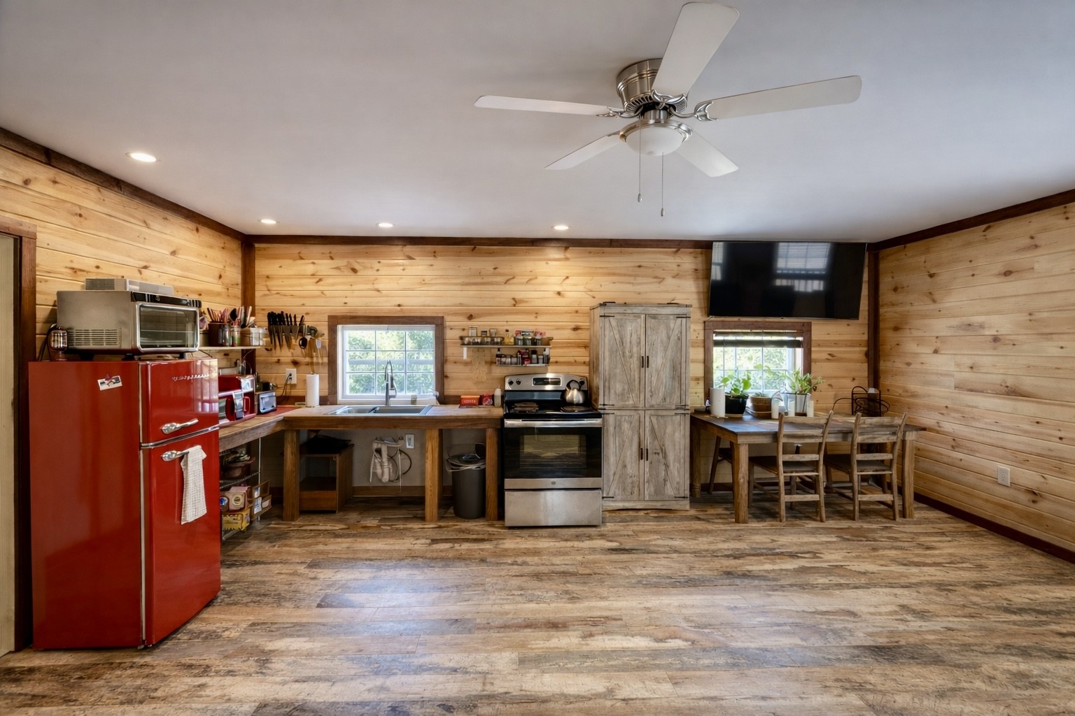 664 Russ Valley Road Lobelville, TN 37097 - Photo 42 of 57 a view of a dining room with furniture window and wooden floor