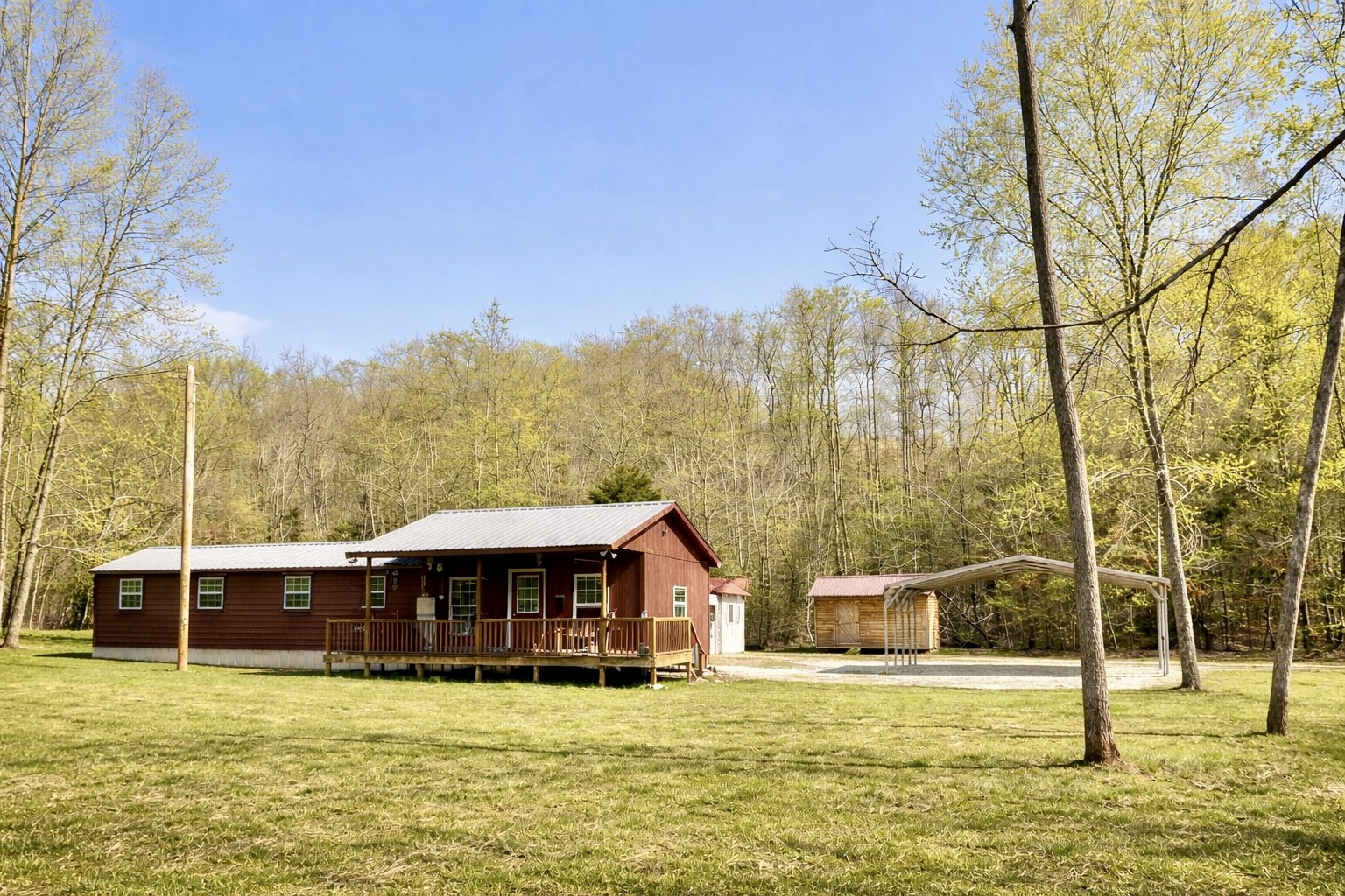 664 Russ Valley Road Lobelville, TN 37097 - Photo 8 of 57 a view of a large pool with an outdoor space and seating area