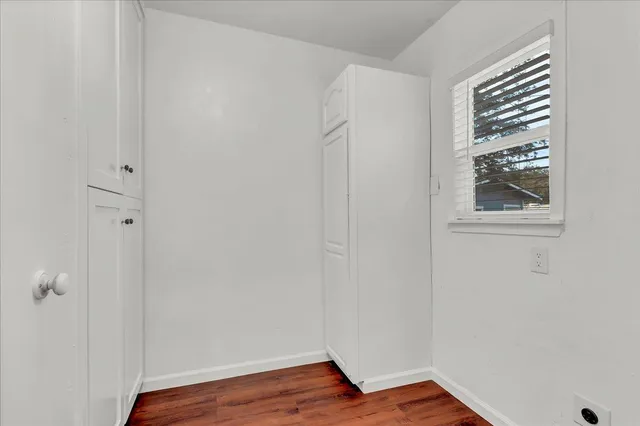 a bathroom with a sink a shower and a mirror
