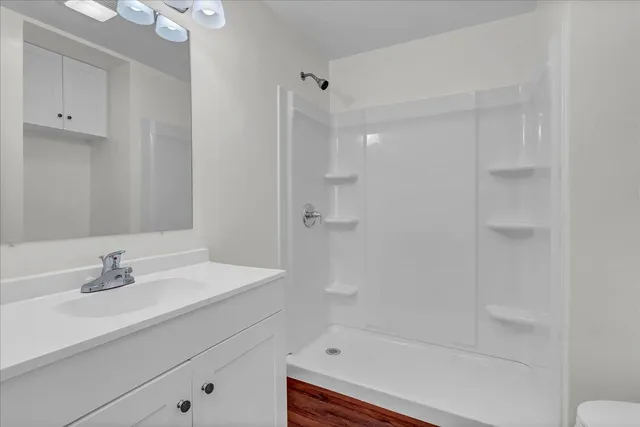 a bathroom with a toilet and a sink