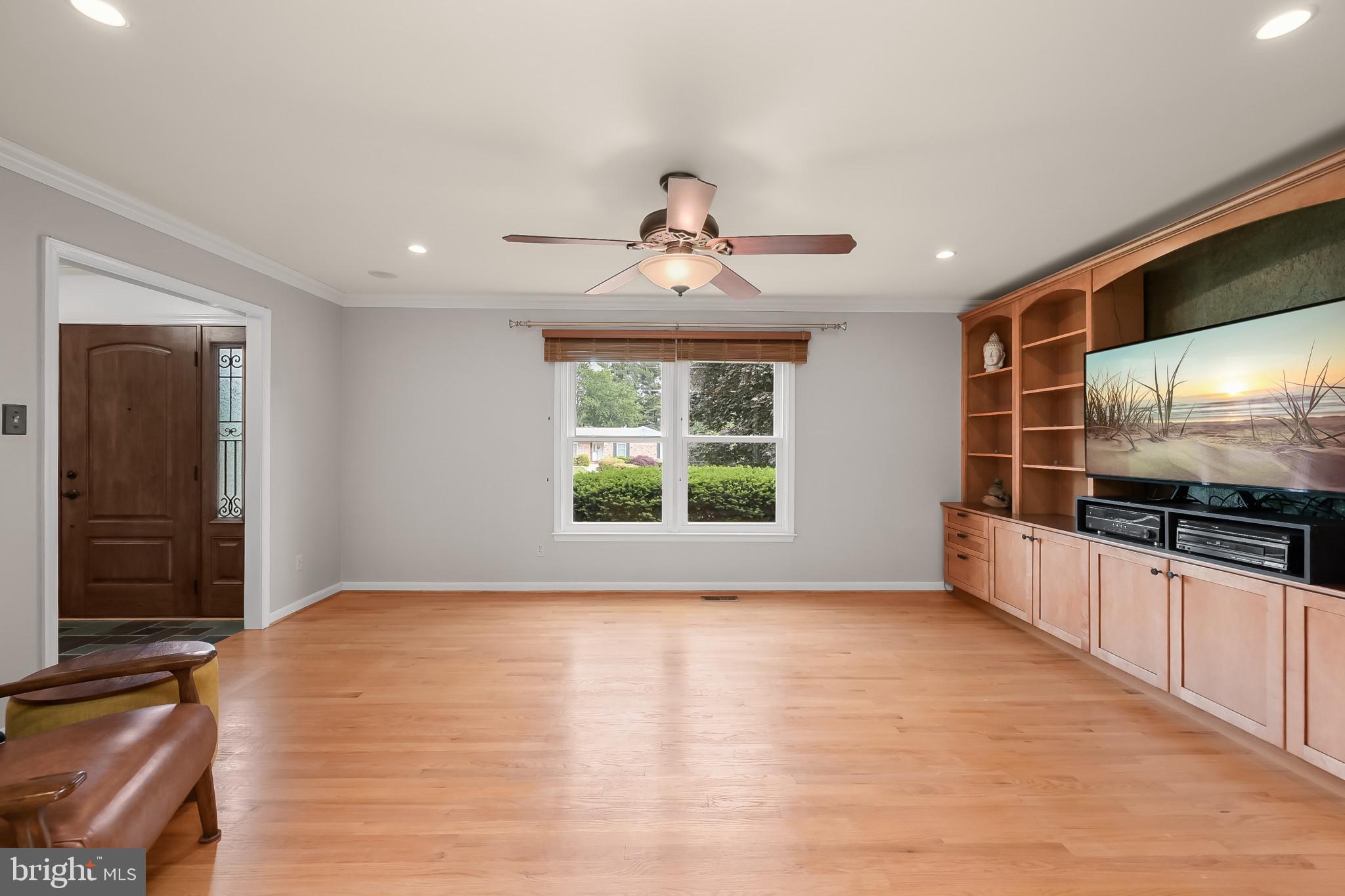 1223 Nottingham Road Westminster, MD 21157 - Photo 12 of 72 Living Room | Hardwood Floors | Built-in Shelving
