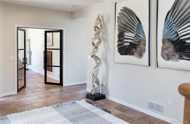 a workspace with furniture and window