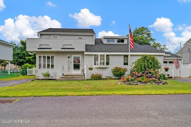 a view of a house with a swimming pool