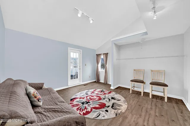 a bedroom with a bed and a chair