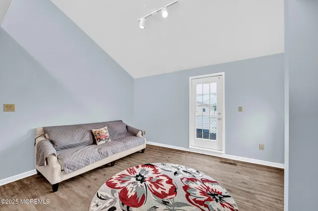 a living room with furniture and window