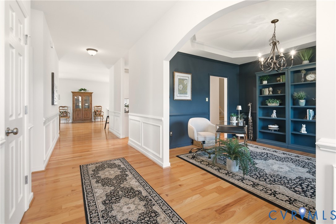 11201 Avening Road Midlothian, VA 23112 - Photo 2 of 20 a very nice looking room with a couch and wooden floor