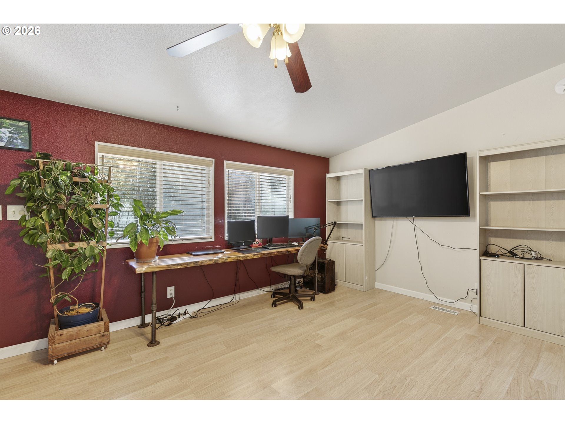 32700 Southeast Leewood Lane Boring, OR 97009 - Photo 12 of 44 a living room with furniture gym equipment and a large window
