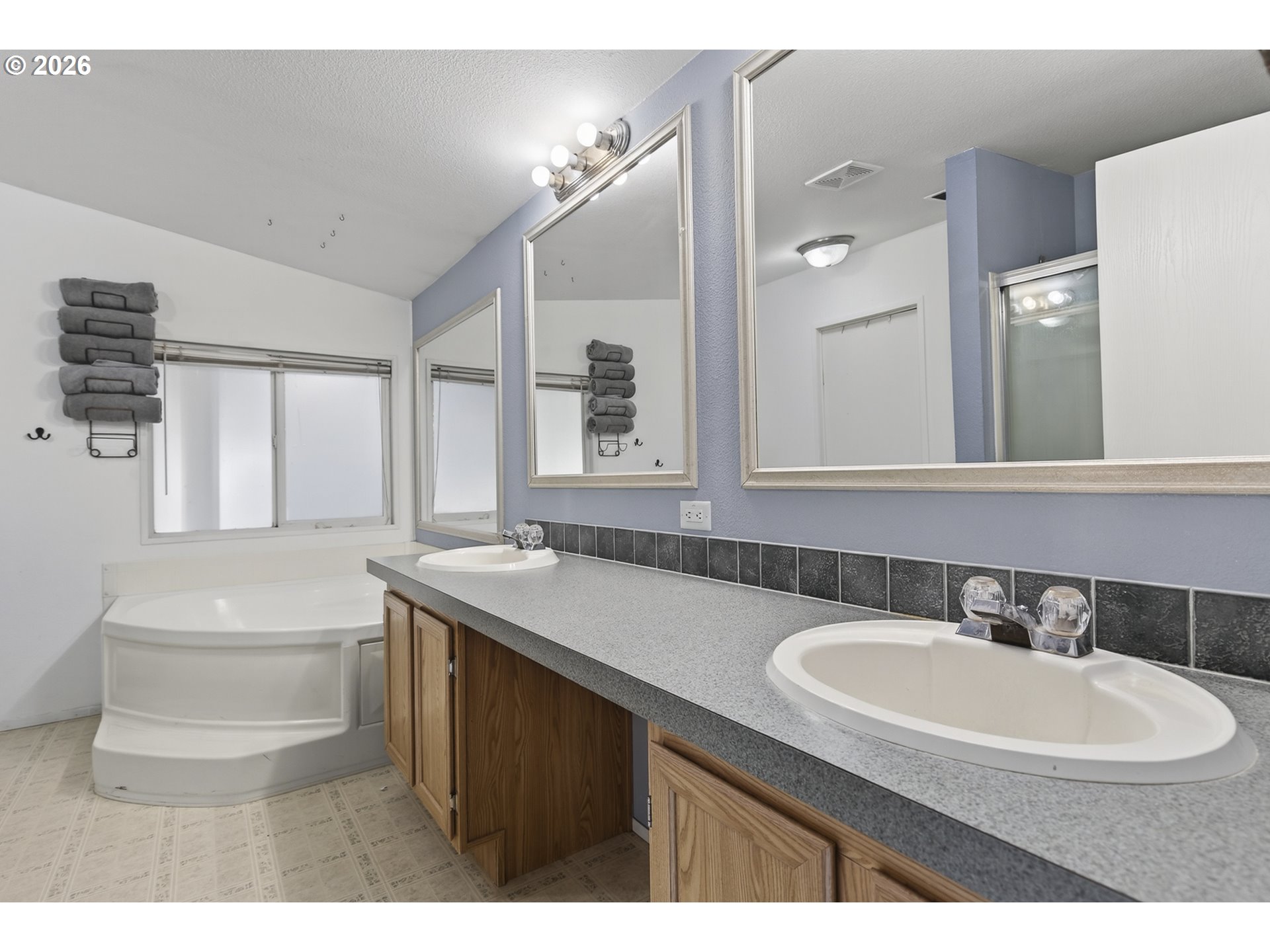 32700 Southeast Leewood Lane Boring, OR 97009 - Photo 26 of 44 a bathroom with a sink and a mirror