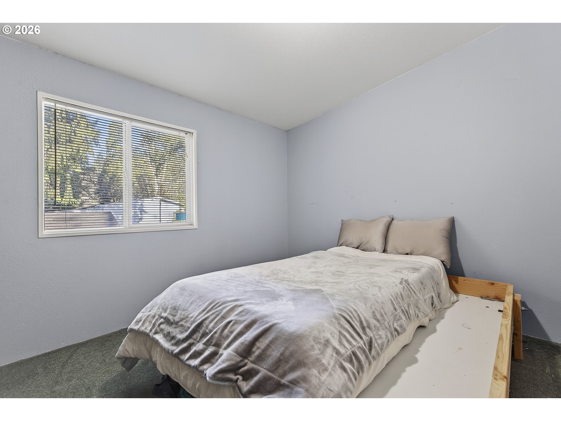 32700 Southeast Leewood Lane Boring, OR 97009 - Photo 5 of 44 a bedroom with a bed and a window