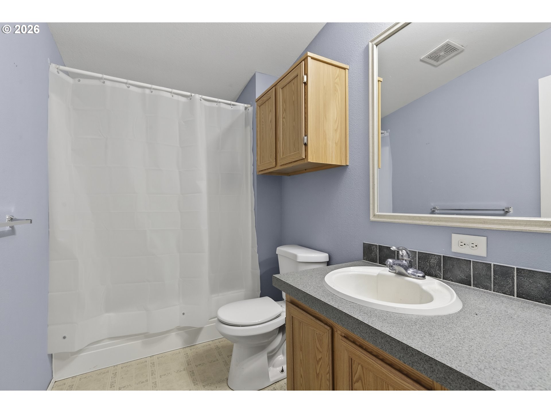 32700 Southeast Leewood Lane Boring, OR 97009 - Photo 9 of 44 a bathroom with a sink toilet and shower