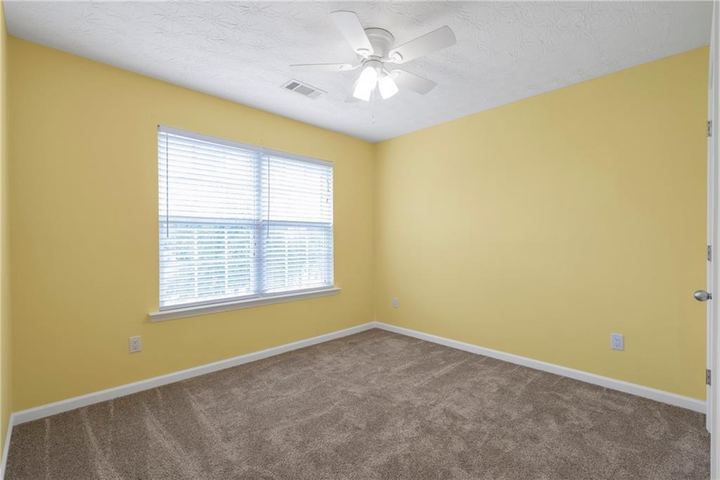709 Roxholly Lane Northeast Buford, GA 30518 - Photo 23 of 35