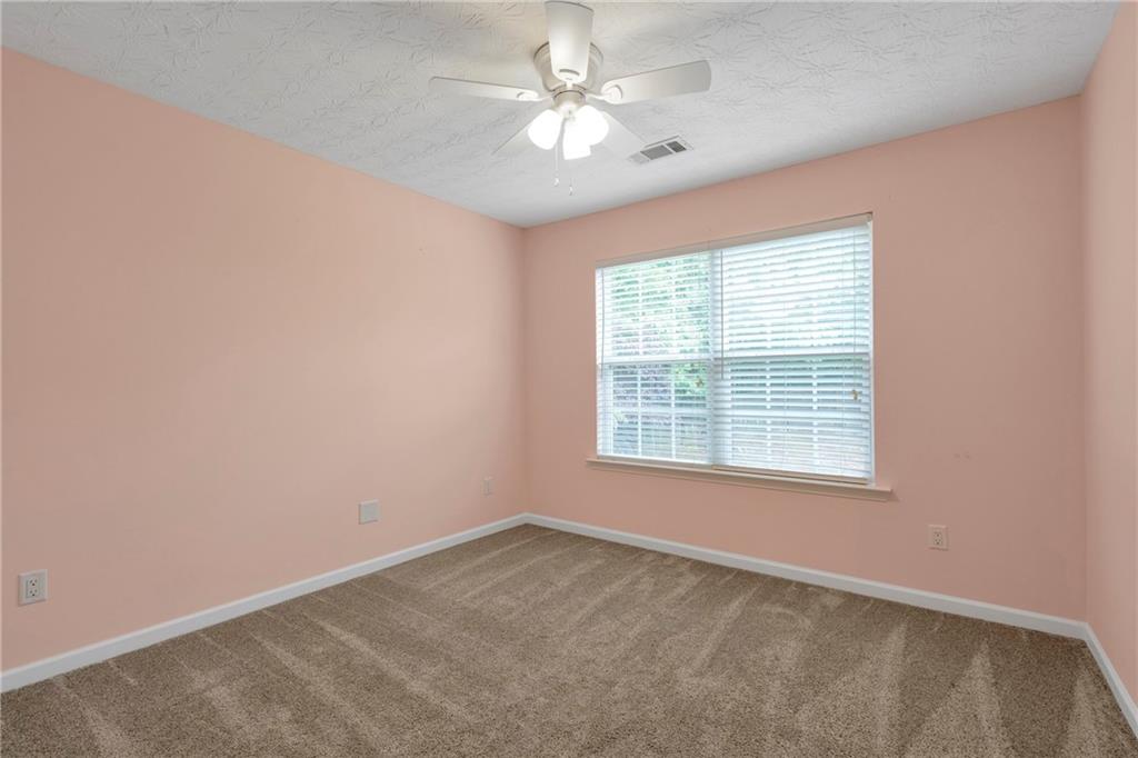 709 Roxholly Lane Northeast Buford, GA 30518 - Photo 24 of 35