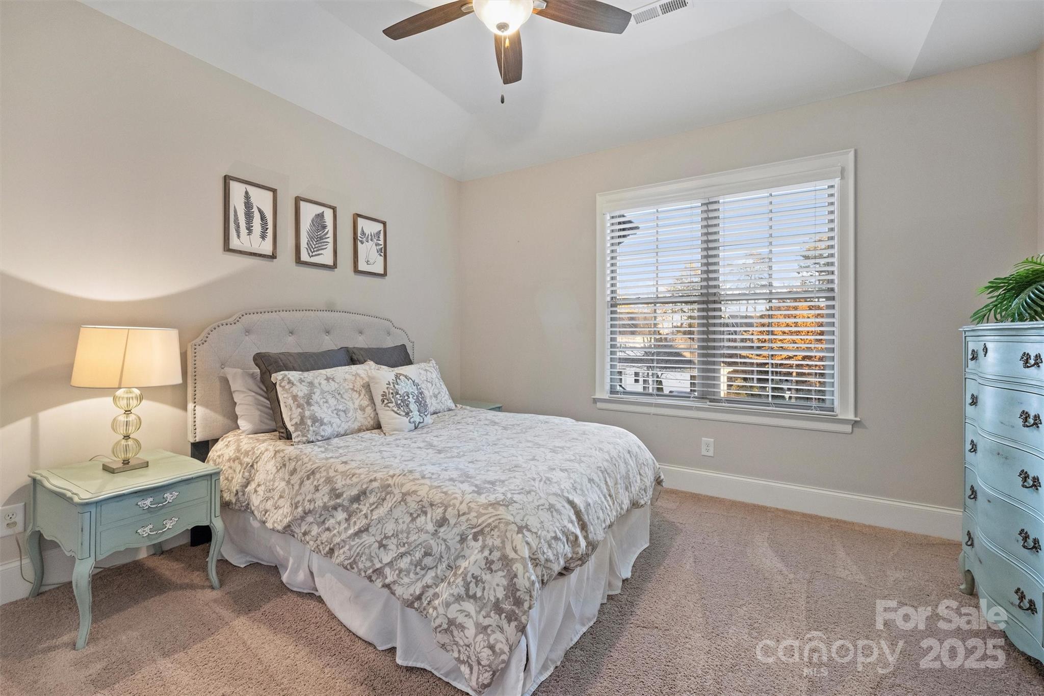 17639 Stuttgart Road Davidson, NC 28036 - Photo 33 of 48 a bedroom with a bed and a window