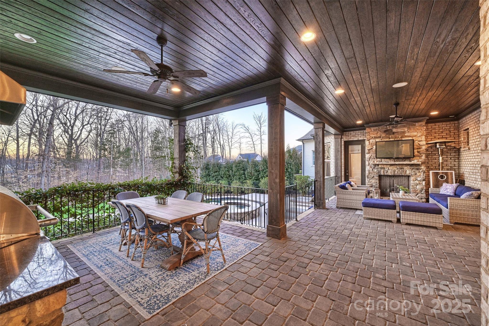 17639 Stuttgart Road Davidson, NC 28036 - Photo 43 of 48 a outdoor space with patio lots of furniture and large windows