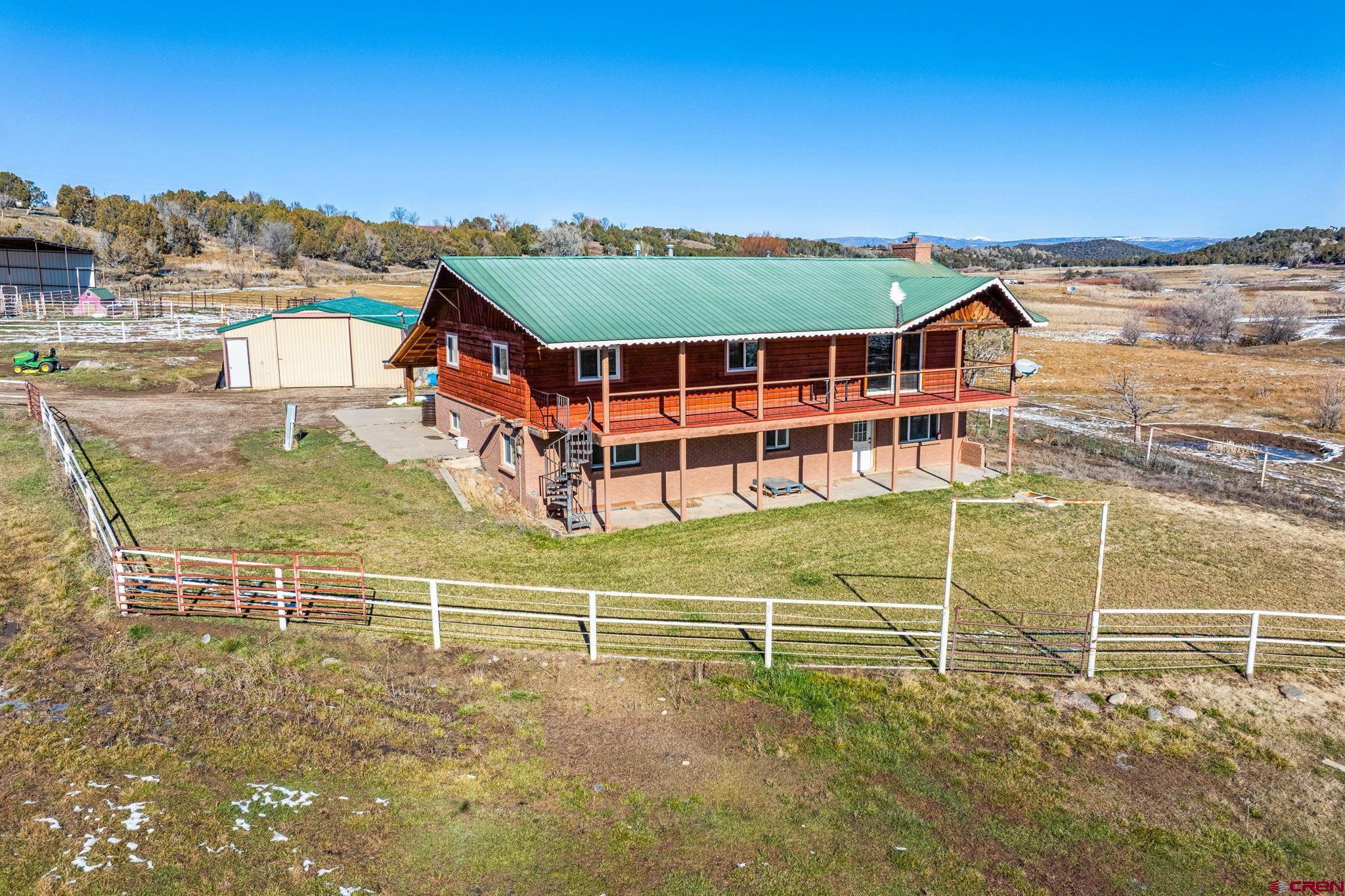 124 Meadow Road Ignacio, CO 81137 - Photo 3 of 37 a view of a swimming pool with an outdoor space