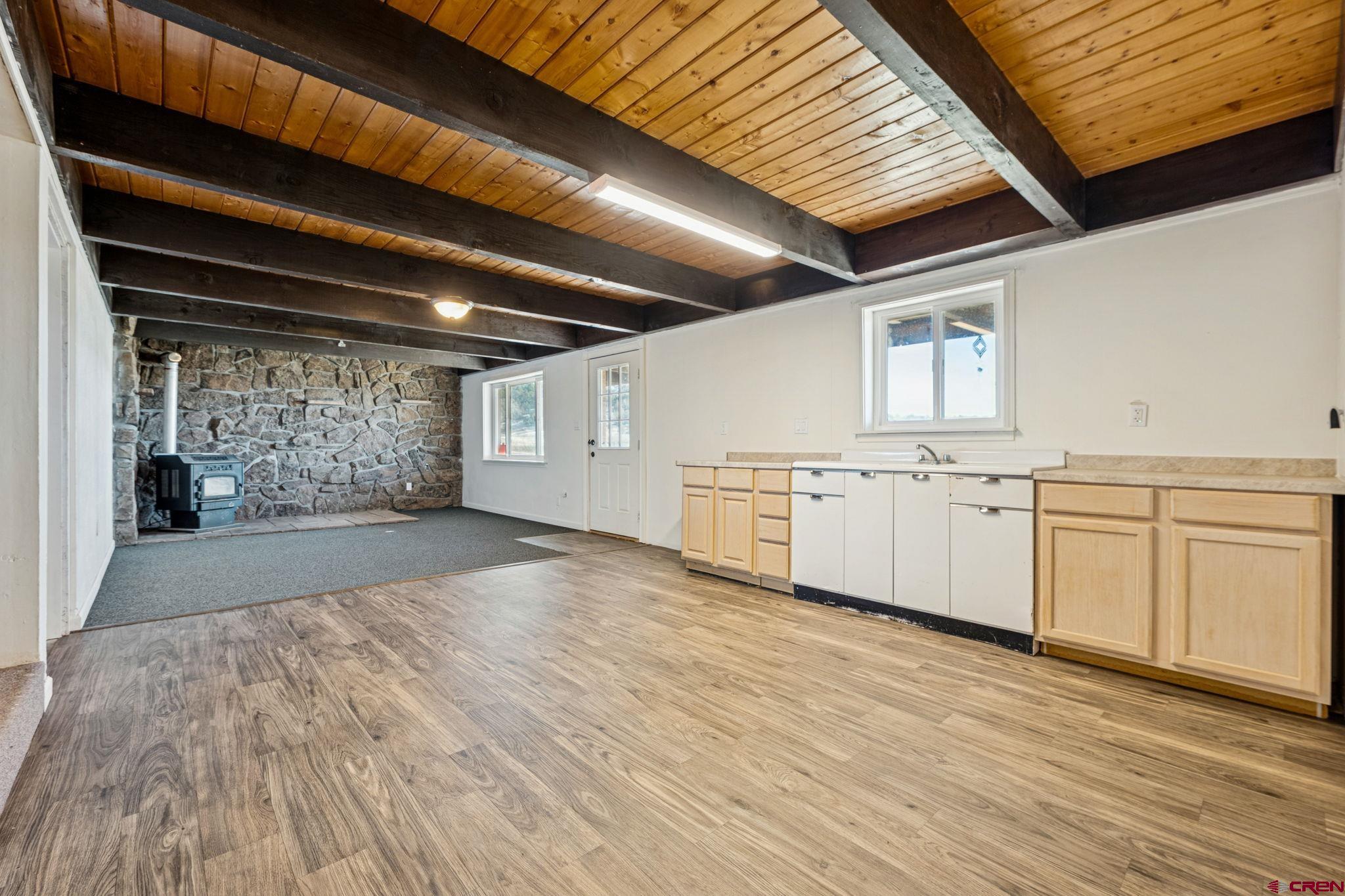 124 Meadow Road Ignacio, CO 81137 - Photo 35 of 37 a view of a kitchen with a sink and cabinets