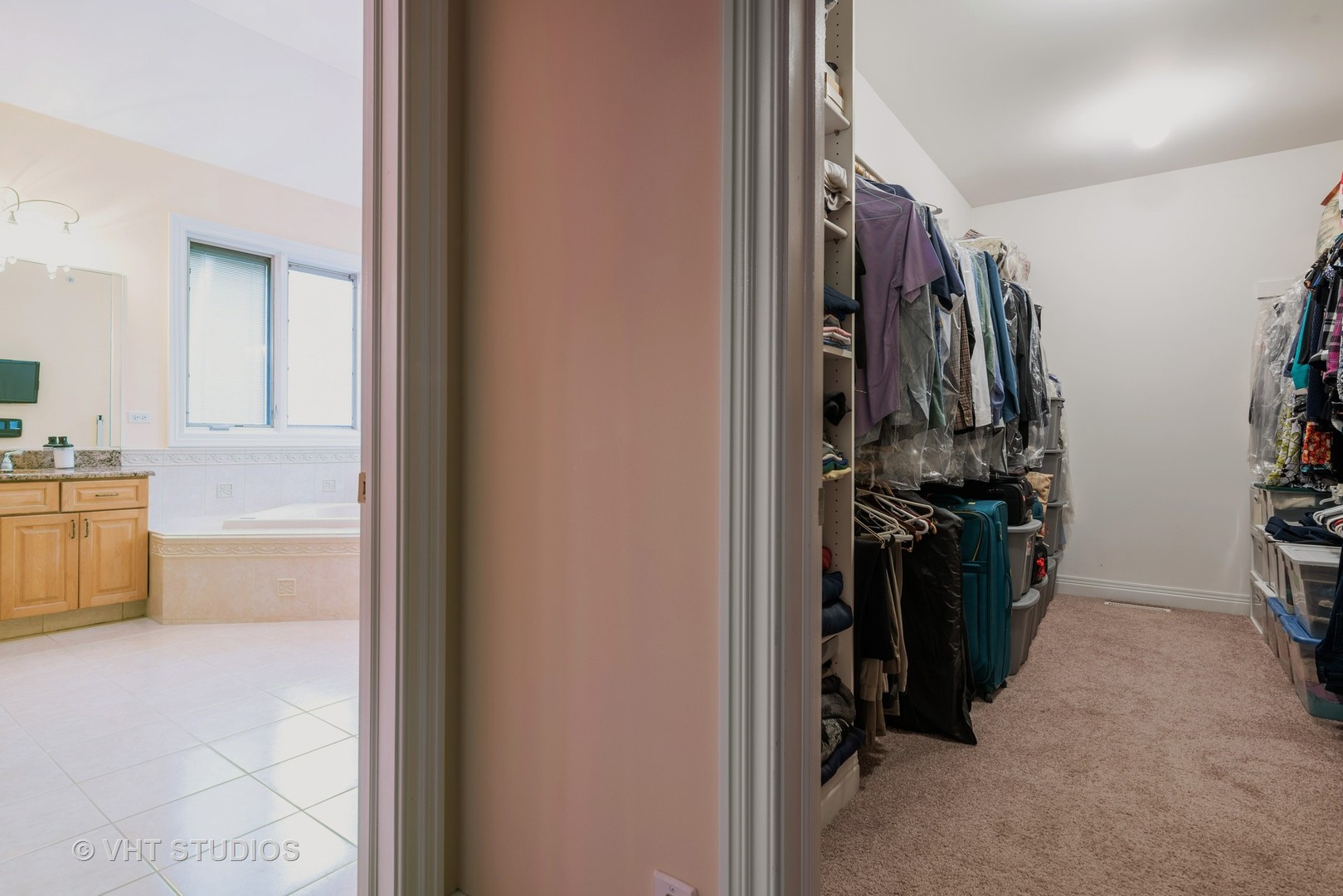 46 North Inverway Road Inverness, IL 60067 - Photo 22 of 41 a view of walk in closet with clothes and shoes