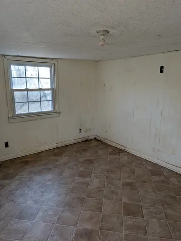 a view of a room with an empty space