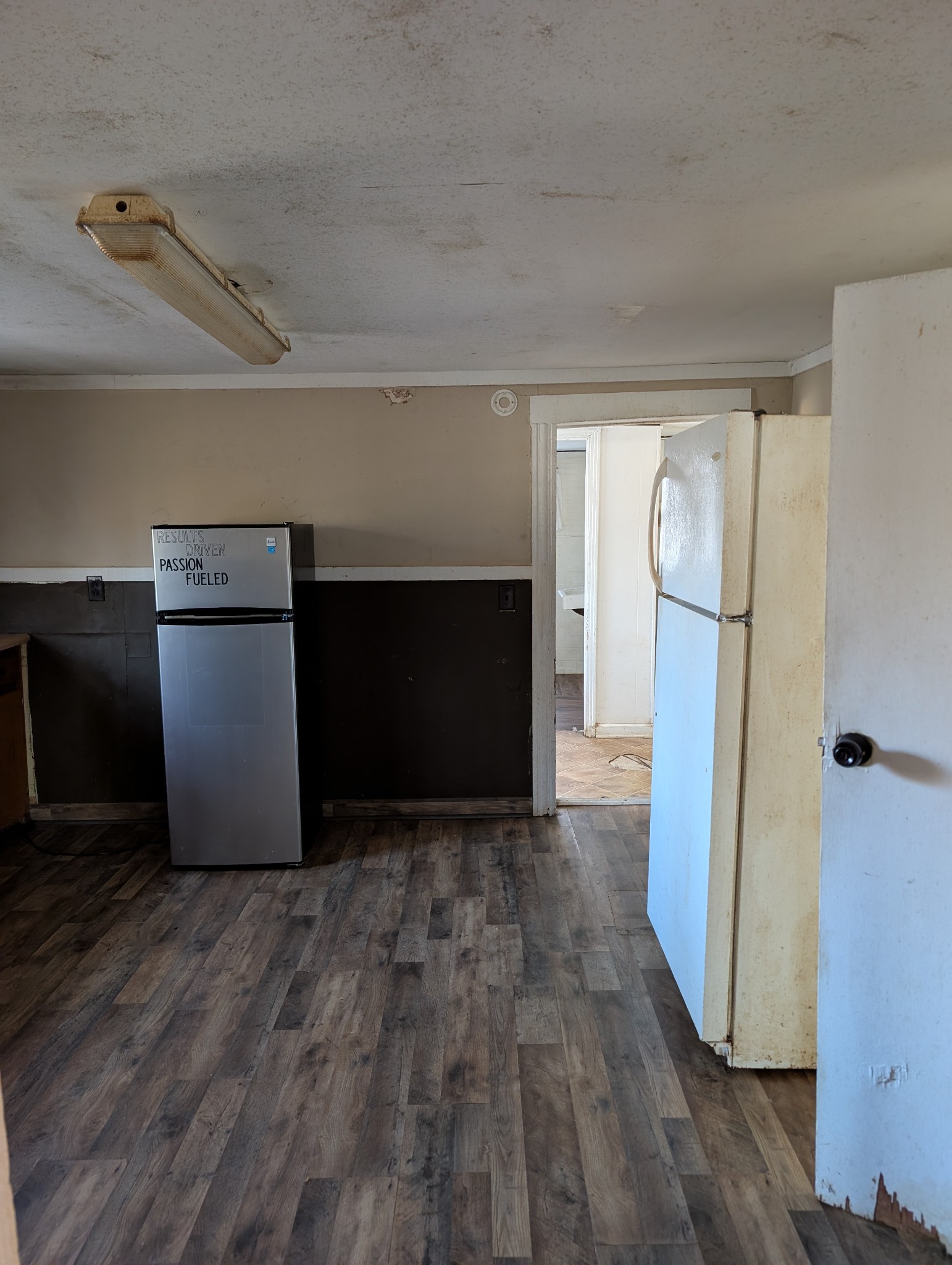 1031 East Pruett Road Dickson, TN 37055 - Photo 15 of 21 a view of empty room with a fireplace and wooden floor