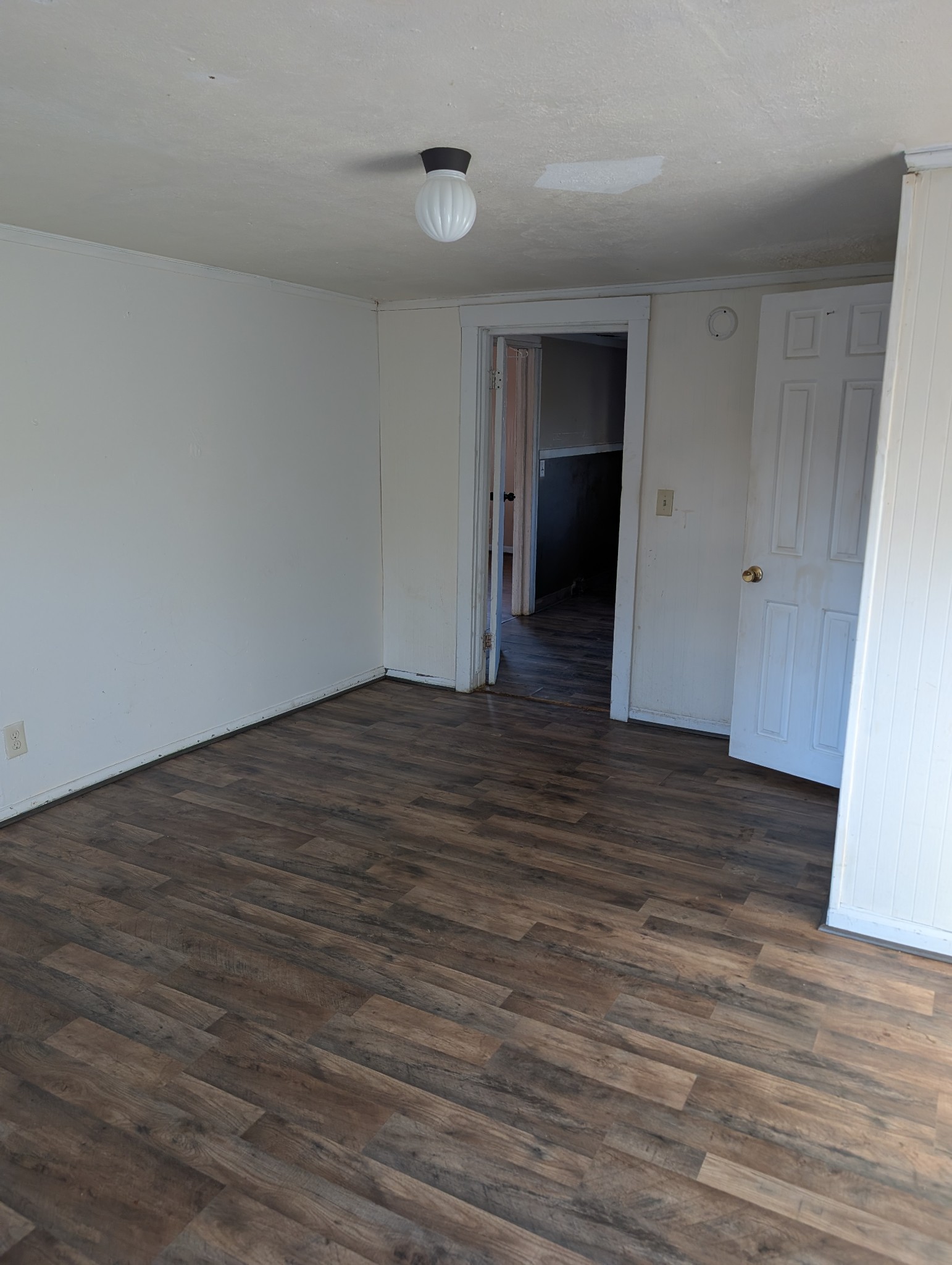 1031 East Pruett Road Dickson, TN 37055 - Photo 20 of 21 a view of an empty room with wooden floor and closet