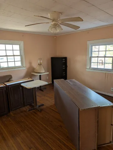 a workspace with furniture and window