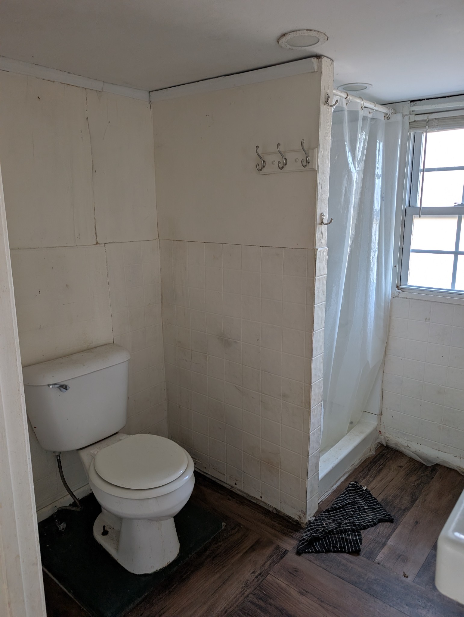 1031 East Pruett Road Dickson, TN 37055 - Photo 9 of 21 a white toilet sitting next to a shower