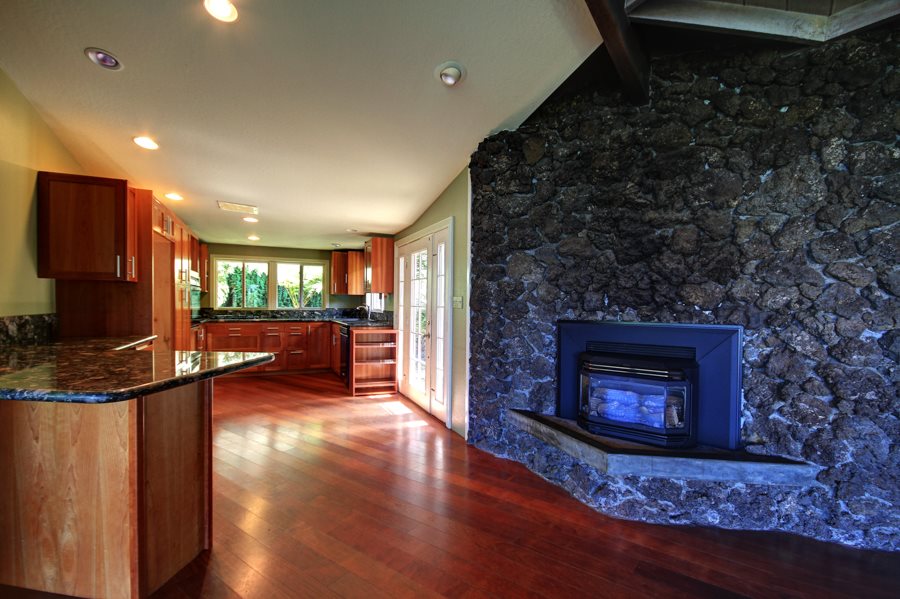 1270 Middle Road Kula, HI 96790 - Photo 4 of 17 a living room with furniture and a fireplace