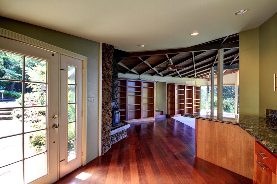 1270 Middle Road Kula, HI 96790 - Photo 7 of 17 a view of an empty room with wooden floor and a window