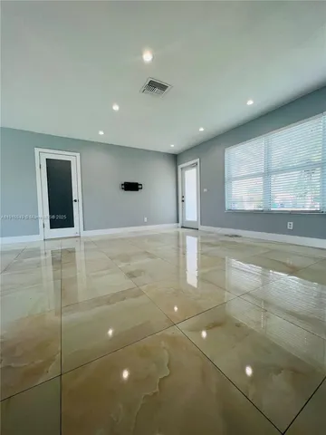 a view of a livingroom with a window