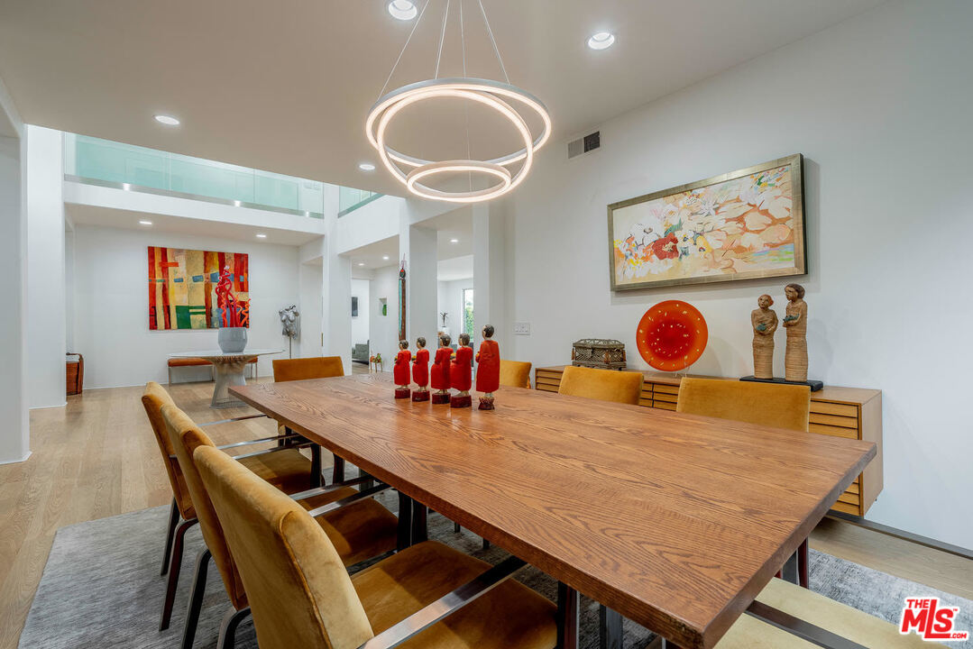 24050 Park Casino Calabasas, CA 91302 - Photo 11 of 43 a view of a dining room with furniture and a chandelier