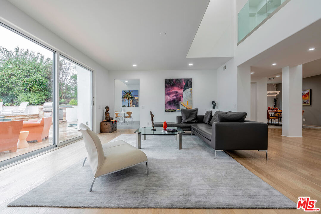 24050 Park Casino Calabasas, CA 91302 - Photo 18 of 43 a living room with furniture and a large window