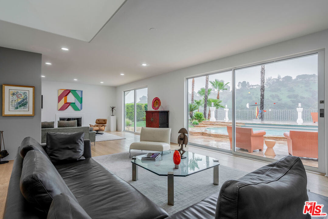 24050 Park Casino Calabasas, CA 91302 - Photo 19 of 43 a living room with furniture and a large window
