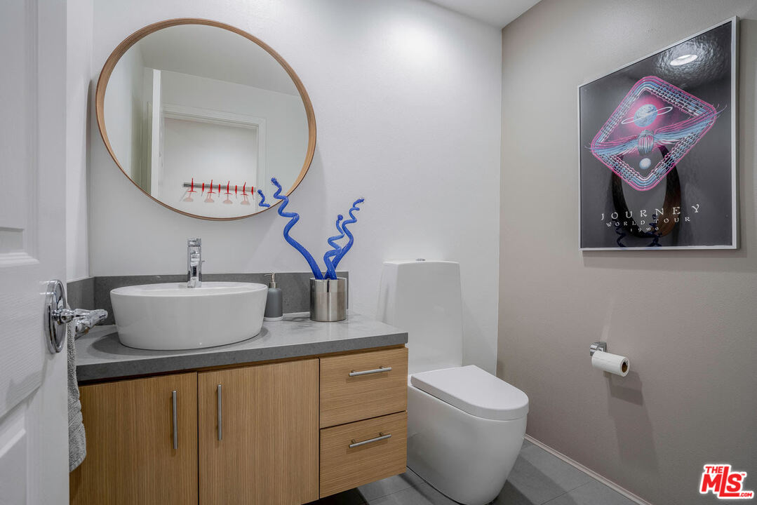 24050 Park Casino Calabasas, CA 91302 - Photo 23 of 43 a bathroom with a toilet sink and mirror