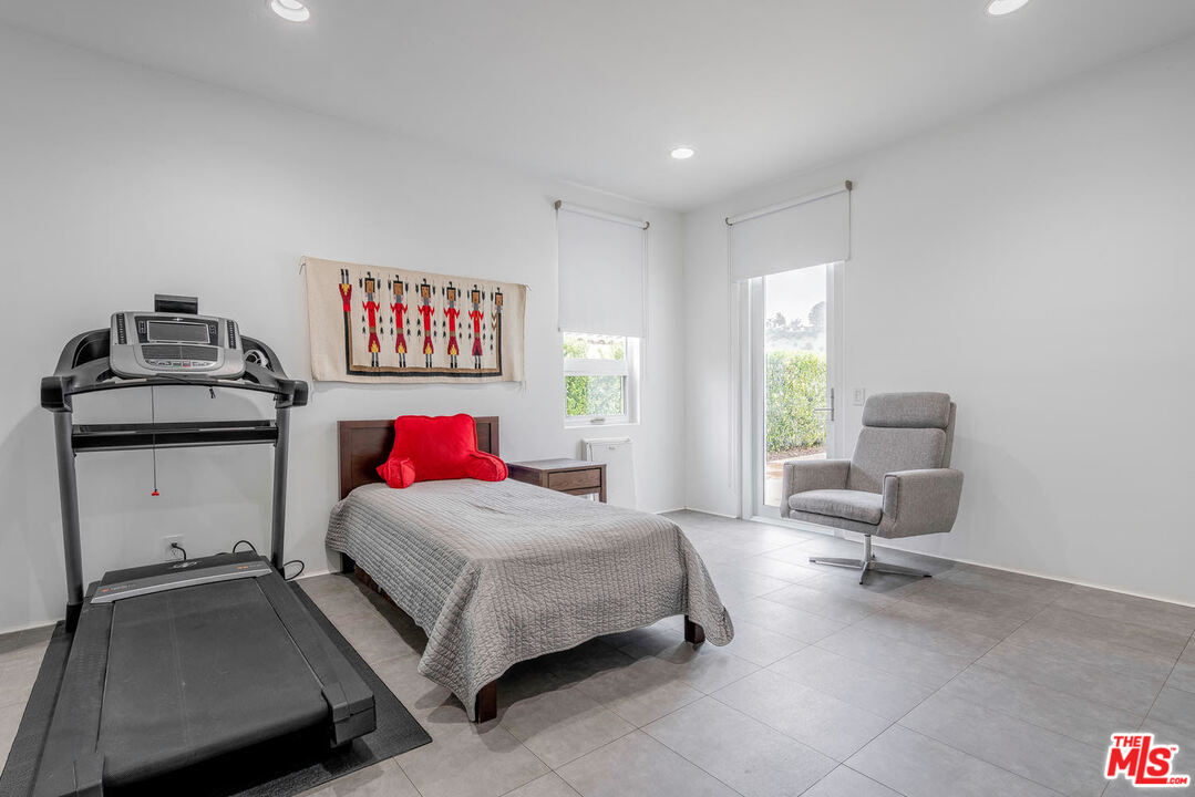 24050 Park Casino Calabasas, CA 91302 - Photo 24 of 43 a bedroom with a bed and dresser