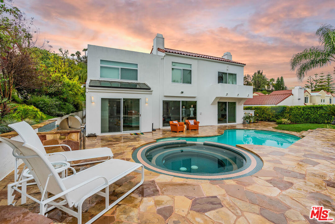 24050 Park Casino Calabasas, CA 91302 - Photo 42 of 43 a view of house with swimming pool outdoor seating area and barbeque oven